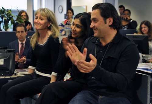 Left to right: Carol Guzy, Nikki Kahn and Ricky Carioti celebrate the announcement of their shared Pulitzer Prize in the Washington Post Newsroom - photo by Bill O'Leary/The Washington Post 