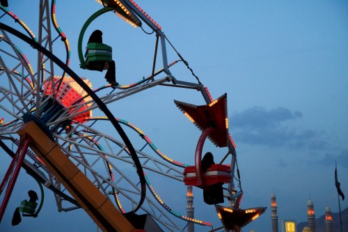 From "Yemen: Day of Reckoning"; used with permission. The FunCity amusement park in Sanaa overlooks the country’s largest mosque and cost $60 million to build. Meanwhile, Yemen is one of the poorest countries in the world, with little opportunity for young people. Although it is difficult for western photographers to work in Yemen because of the lack of security, Sinclair, who had been to Yemen twice for a 2011 article on adolescent brides, was determined to return. “Traveling by road I wore a niqab, the veil that leaves only your eyes visible. At some checkpoints, I used an additional veil that covered my eyes. It was a strange feeling, but I was able to visit places that would have been much more difficult, if not impossible, were I not a woman.”STEPHANIE SINCLAIR - YEMEN: DAY OF RECKONING, SEPTEMBER 2012